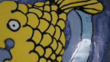 Load image into Gallery viewer, Round three legged bowl with yellow fish