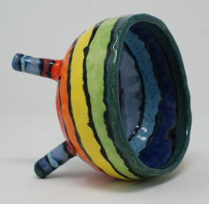 Delightful colourful pinched four legged bowl