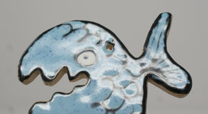 Turquoise Ugly Fish trinket