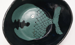 Black bowl with green fish