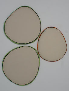 Set of three small colorful plates