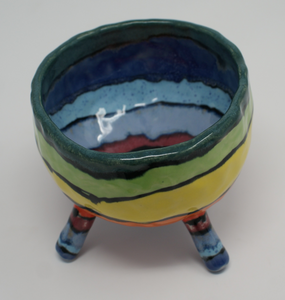 Delightful colourful pinched four legged bowl